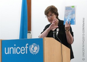 UNICEF Statistics and Monitoring Associate Director Tessa Wardlaw speaks at the launch of Progress for Children: A report card on adolescents, at UNICEF House. She is holding a copy of the report. The podium bears the UNICEF logo. On 24 April 2012, UNICEF launched Progress for Children: A report card on adolescents at UNICEF House. The report calls for increased attention to, and investment in, all aspects of the lives of the worlds 1.2 billion adolescents aged 10 and 19 years. Globally, despite significant health and education progress over the past 20 years, an estimated 1.4 million adolescents die each year from traffic injuries, childbirth complications, suicide, AIDS and other causes. Children entering adolescence are also increasingly at risk of violence, both domestic and other forms. Additionally, while 90 per cent of children of primary school age are in school, 71 million children of lower secondary school age do not attend school and 127 million young people, aged 15-24 years, are illiterate. Adolescents in sub-Saharan Africa a group that is projected to be the largest adolescent population in the world by 2050 are particularly at risk. All these challenges combine to impede adolescent contributions to positive change in environments where they can be both protected and encouraged to maximize their creativity, innovation and energy helping to solve their own problems and problems in their communities. The Lancets Adolescent Series on Health was also launched at the event.