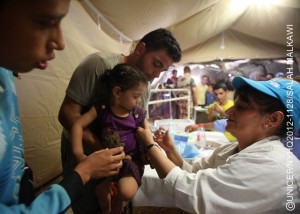 A health worker vaccinates a girl against measles, during the UNICEF-supported immunization campaign, in a mobile hospital in Zaatari, a tented camp for Syrian refugees. The camp, which presently hosts over 27,000 refugees, is located on the outskirts of Mafraq, capital of the northern Mafraq Governorate. By mid-September 2012, Jordan was hosting 86,940 refugees from Syrias escalating war. Syrians have also fled to nearby Iraq, Lebanon and Turkey, inging the total number of refugees to over 260,500. Inside Syria, some 2.5 million people have been affected by the conflict, of which 1.2 million  half of them children  are displaced. Deaths, including of children and women, have surpassed 18,000. In Jordan, the number of refugees continues to increase. On 11 September, UNICEF and the Ministry of Health, in coordination with the World Health Organization and other partners, launched a large-scale polio and measles vaccination campaign targeting over 100,000 children staying in the Zaatari refugee camp, nearby transit centres and in host communities. UNICEF continues working with diverse governments, other United Nations organizations and local and international NGOs to respond to the needs of affected children in all host countries and inside Syria. UNICEF also supports initiatives in education, water, sanitation and hygiene and child protection, including the provision of child-friendly spaces and psychosocial assistance for children traumatized by their experiences in relation to the conflict. To fund this work, UNICEF has requested US$65 million, of which only 38 per cent has been received to date.