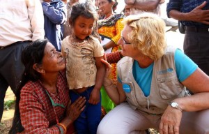 A young girl and her mother speak with UNICEF South Asia Regional Director Karin Hulshof. On 1 May 2015, UNICEF distributed emergency supplies to one of the five worst earthquake-affected districts in Nepal. UNICEF South Asia Regional Director Karin Hulshof and UNICEF Representative to Nepal Tomoo Hozumi were on hand to witness the distributions of two medical tents and 15 boxes of hygiene kits and to learn about the impact of the earthquake on residents of Maidi village in Dhading district. One week on from the earthquake in Nepal, UNICEF says the health and wellbeing of children affected by the disaster are hanging in the balance  as many have been left homeless, in deep shock and with no access to basic care. With the monsoon season only a few weeks away, children will be at heightened risk of diseases like cholera and diarrhoeal infections, as well as being more vulnerable to the threat of landslides and floods. The April 25 earthquake flattened more than 130,000 homes and left 3 million people in need of food assistance. Some 24,000 people are currently staying in 13 camps in Kathmandu. In a country where just over 40 per cent of children are stunted, fears for childrens nutrition are rising. At least 15,000 children with severe acute malnutrition require therapeutic feeding. There is also an urgent need for children in the 12 most affected districts to get back to their normal routine by setting up child-friendly spaces, opening schools and providing access to basic services, such as health and water. In the past week, UNICEF has flown in more than 85 tons of aid, including tents, plastic sheeting, blankets and life-saving medicines; set up child friendly spaces in informal camps, to offer support to help children recover from their experiences and a safe place where they can play and learn; and set up psychological support services in Gorkha, Kaski, Sindhuli, Kavre, Ramechhap and Kathmandu. UNICEF has also delivered aid to remote areas outside